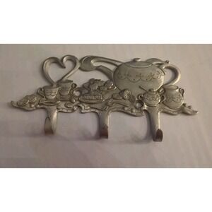Practical solid pewter three-hook wall hanger in a teapot design